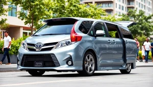 Showcasing toyota sienna modifications with enhanced features in a lively urban setting.